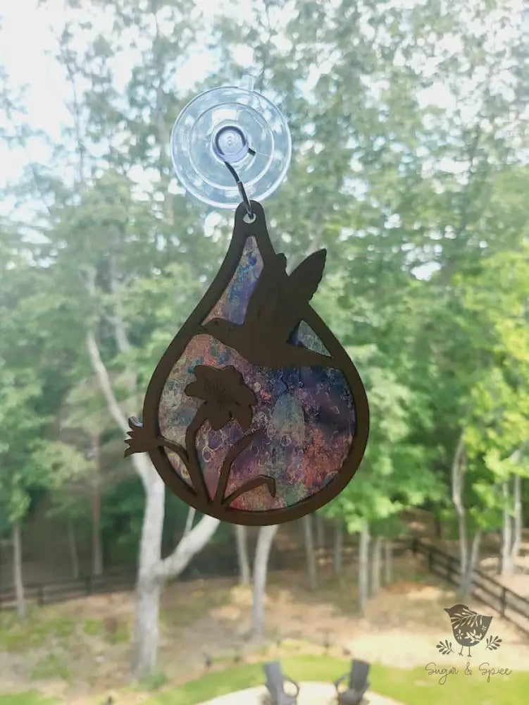 Oil Slick Hummingbird Sun Catcher - Premium  from Sugar and Spice - Just $15! Shop now at Sugar and Spice Paper