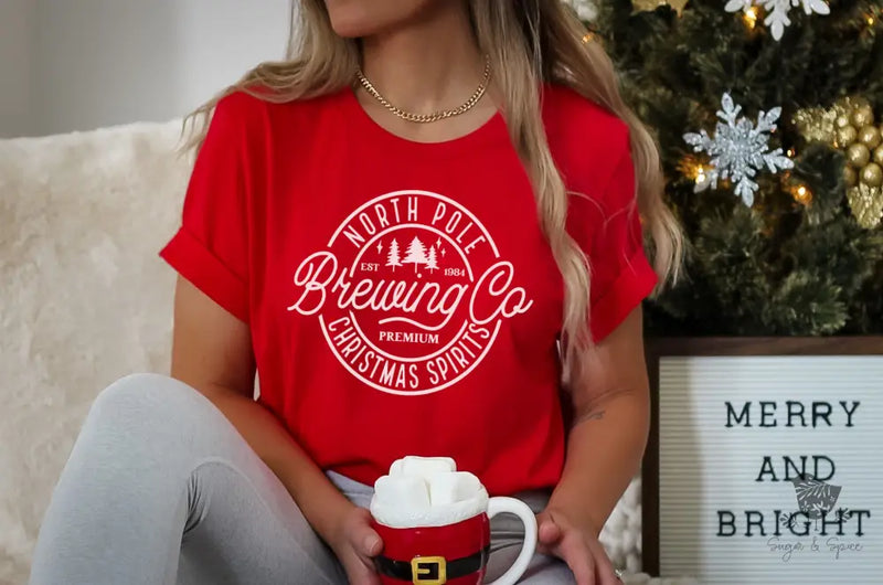 North Pole Brewing Co Christmas T-Shirt - Premium T-Shirt from Printify - Just $24.29! Shop now at Sugar and Spice Paper