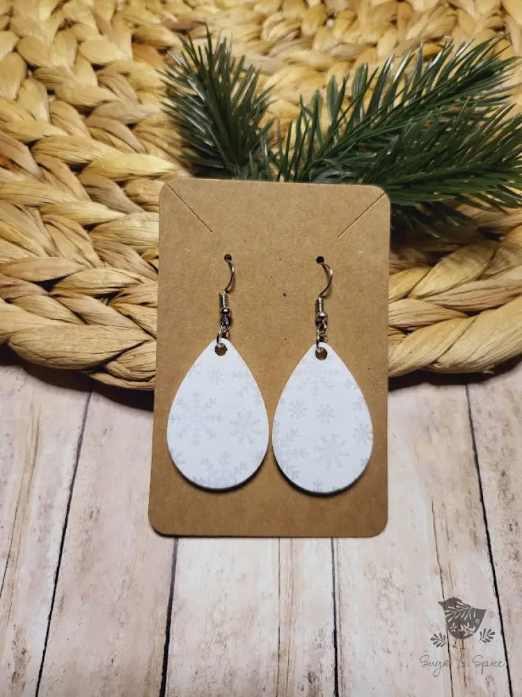White Snowflake Holiday Dangle Earrings - Premium  from Sugar and Spice Invitations - Just $11.25! Shop now at Sugar and Spice Paper