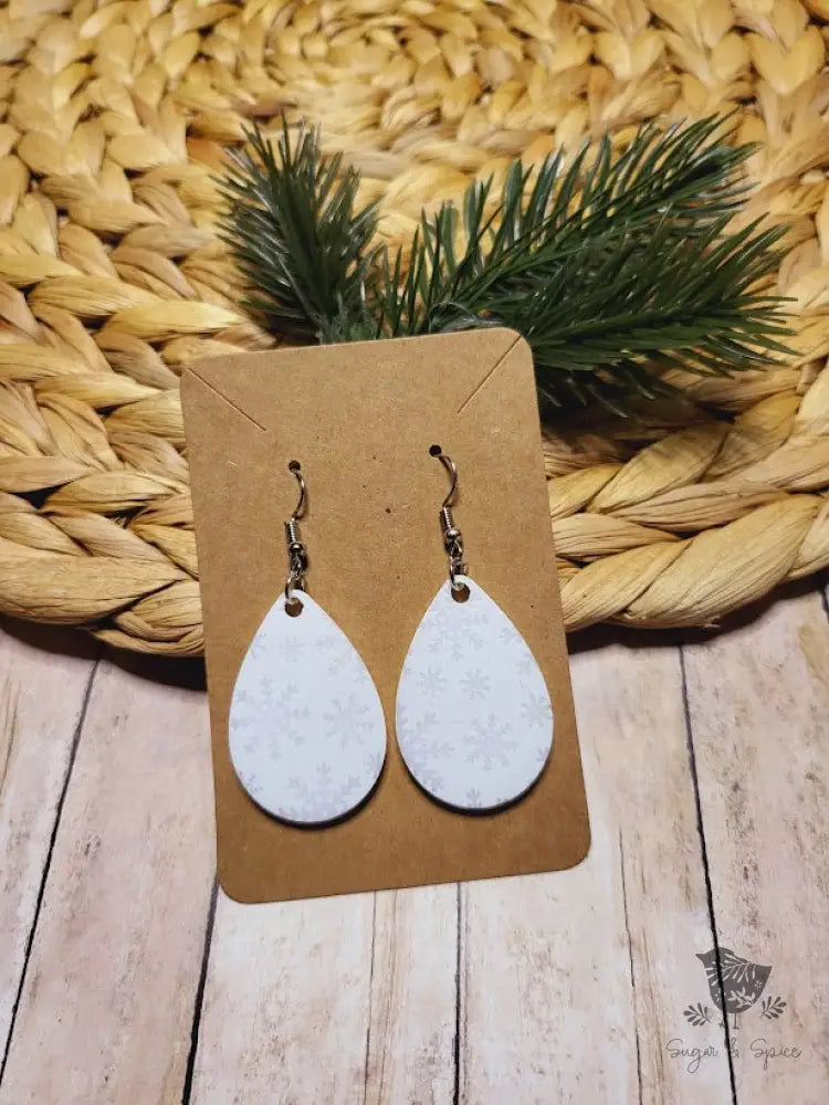 White Snowflake Holiday Dangle Earrings - Premium  from Sugar and Spice Invitations - Just $11.25! Shop now at Sugar and Spice Paper